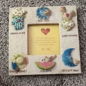 NWT ceramic picture frame with embossed art